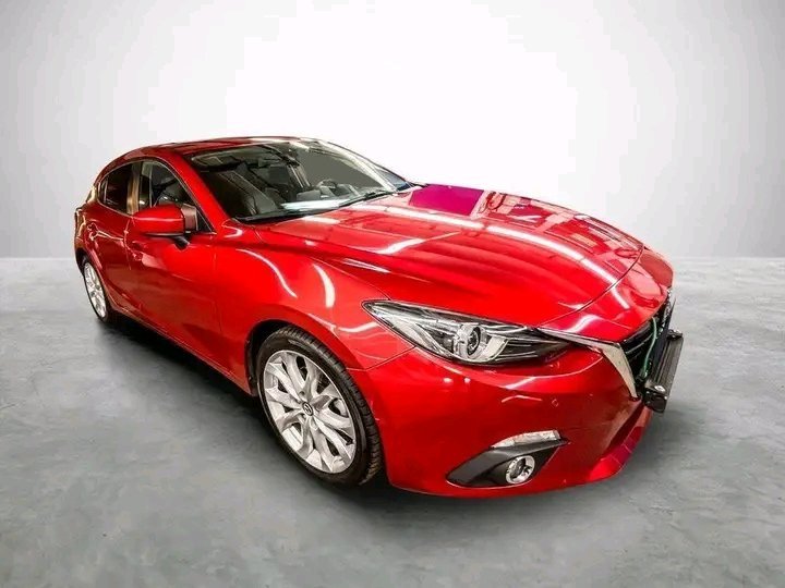 1000020559.jpg Mazda 3
