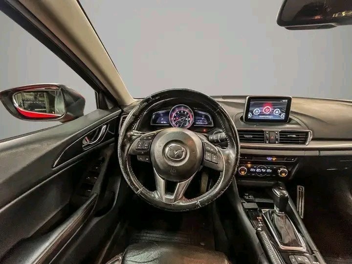 1000020566.jpg Mazda 3