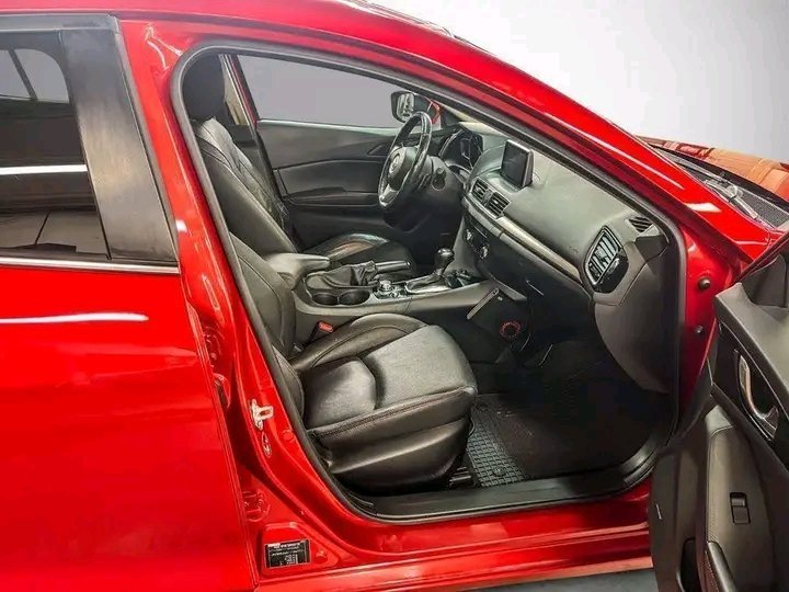 1000020568.jpg Mazda 3