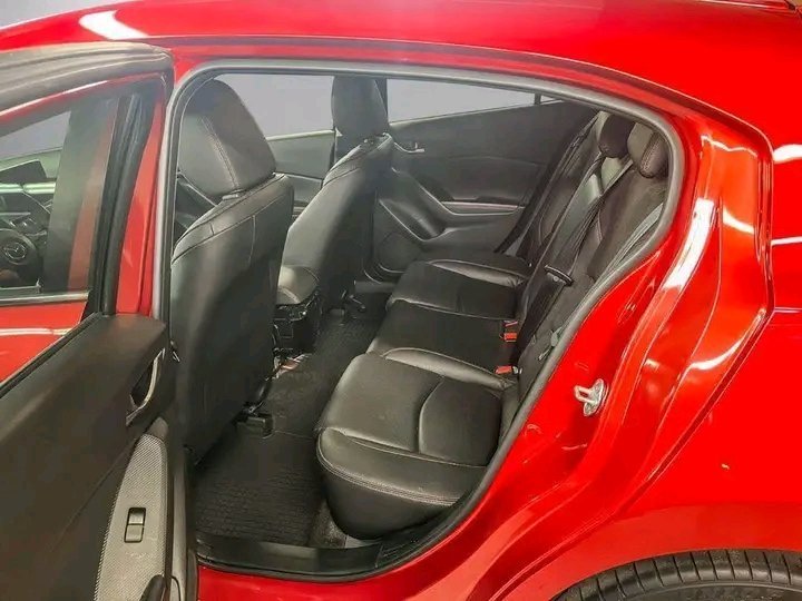 1000020570.jpg Mazda 3
