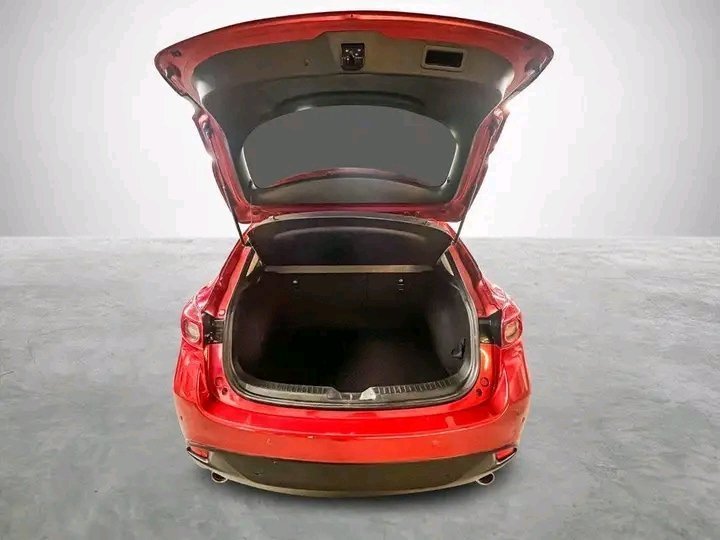 1000020571.jpg Mazda 3