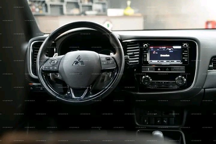 1000021401.jpg Mitsubishi Outlander