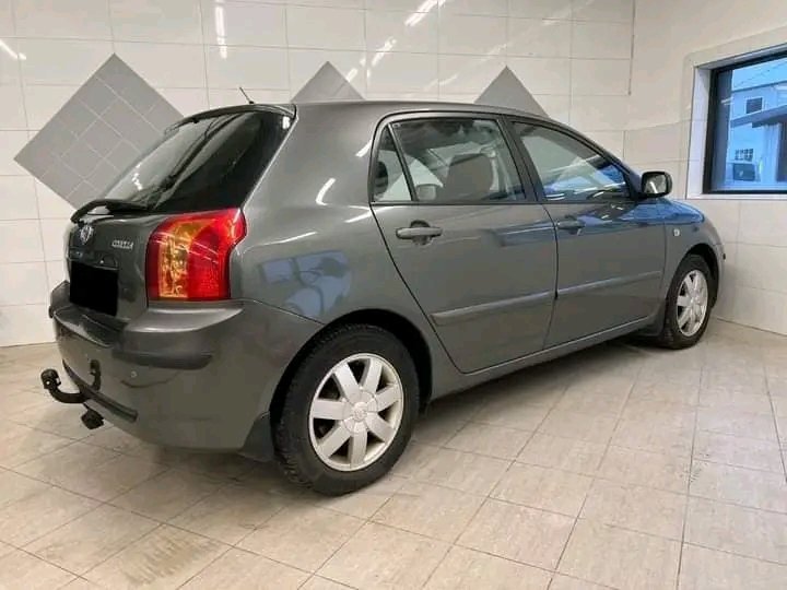 1000024904.jpg Toyota Corolla