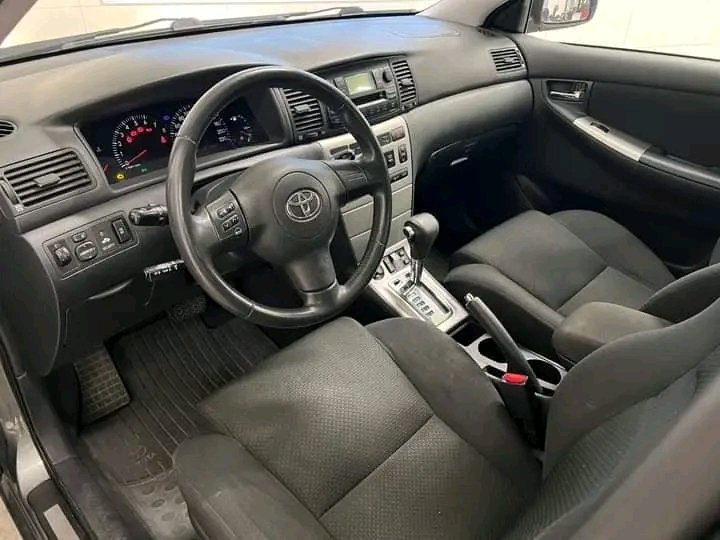 1000024914.jpg Toyota Corolla