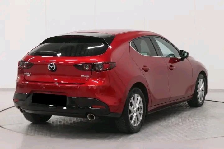 1000026074.jpg Mazda 3 Cosmo