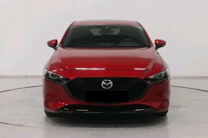 1000026076.jpg Mazda 3 Cosmo